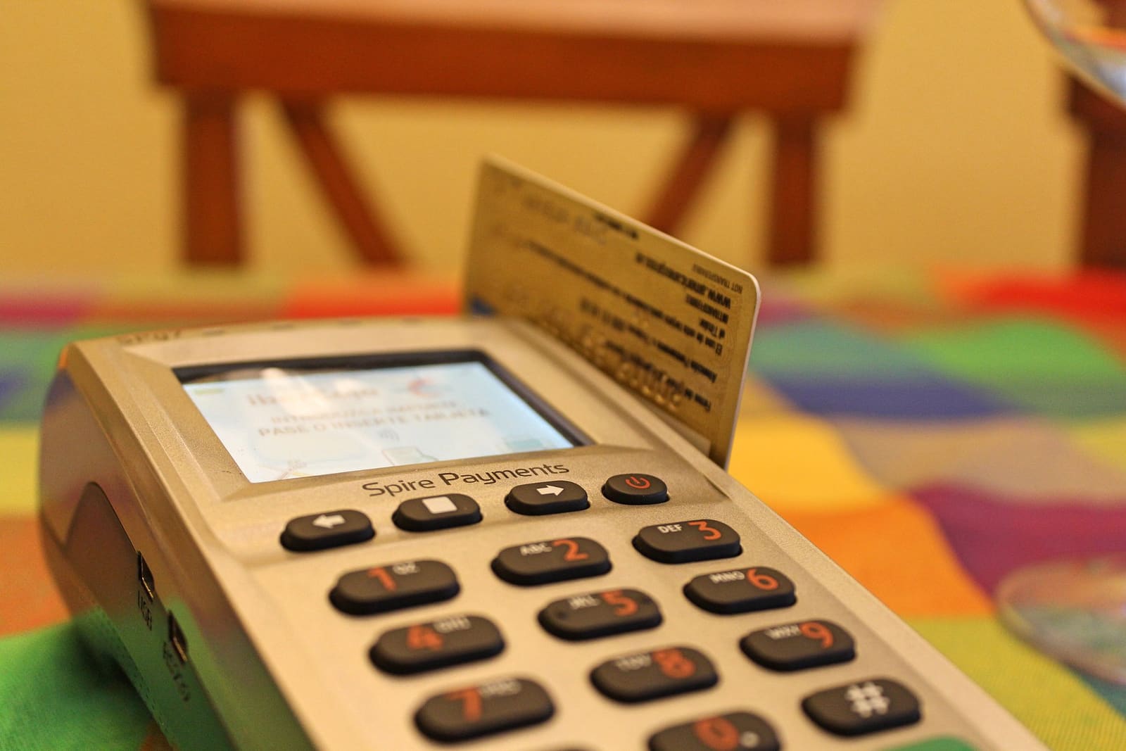 A payment card inserted in a card terminal on a table